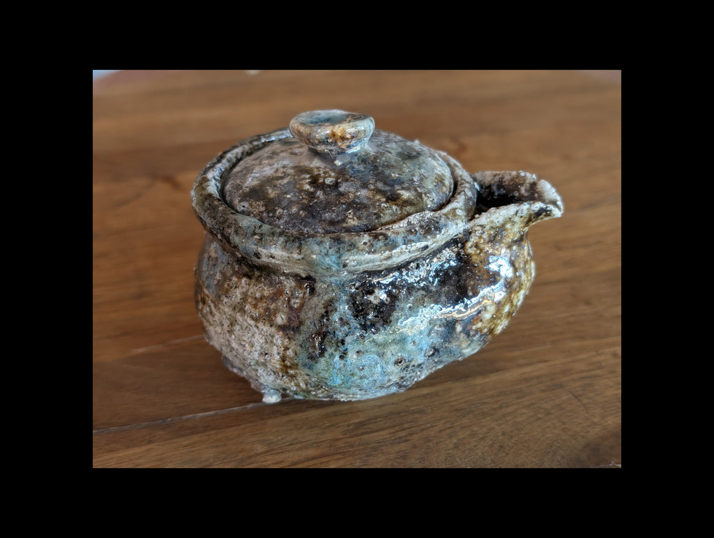 Hohin in granitic porcelain, double firing- high-temperature charcoal firing.